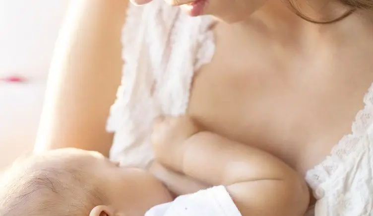 Mother breastfeeding her baby.