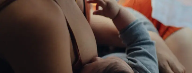 Mother breastfeeding her baby.